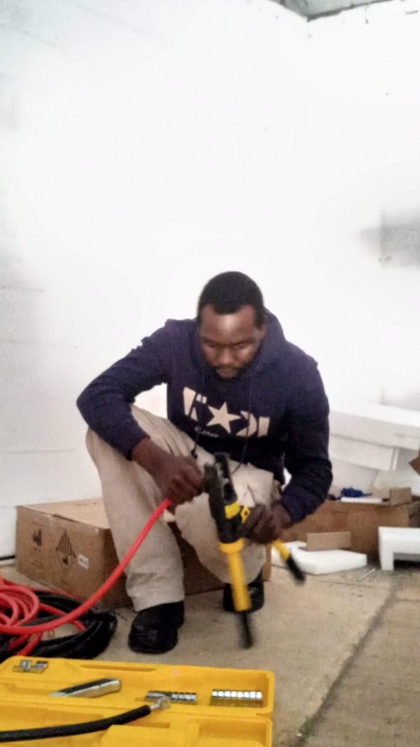 Technician working on electrical equipment